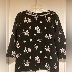 Large Ann Taylor Black Shell top. Grey/white flower pattern. 95% Poly 5% Spandex
